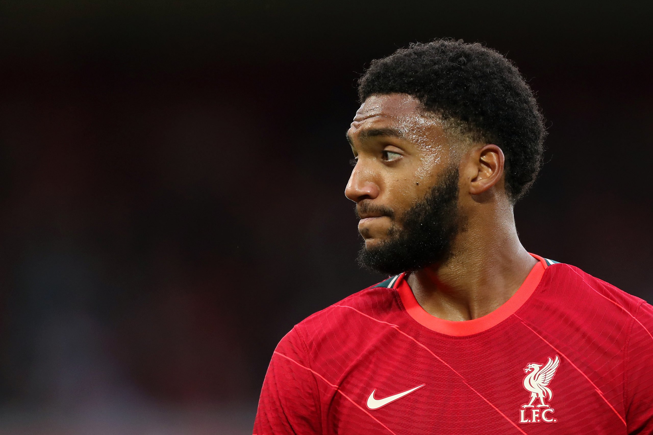 LIVERPOOL, ENGLAND - AUGUST 09: Joe Gomez of Liverpool looks on during the Pre-Season Friendly match between Liverpool and Osasuna at Anfield on August 09, 2021 in Liverpool, England. (Photo by Lewis Storey/Getty Images)https://the4thofficial.net/2021/12/liverpool-join-the-race-for-this-wolves-starlet-should-the-reds-pursue-a-deal/