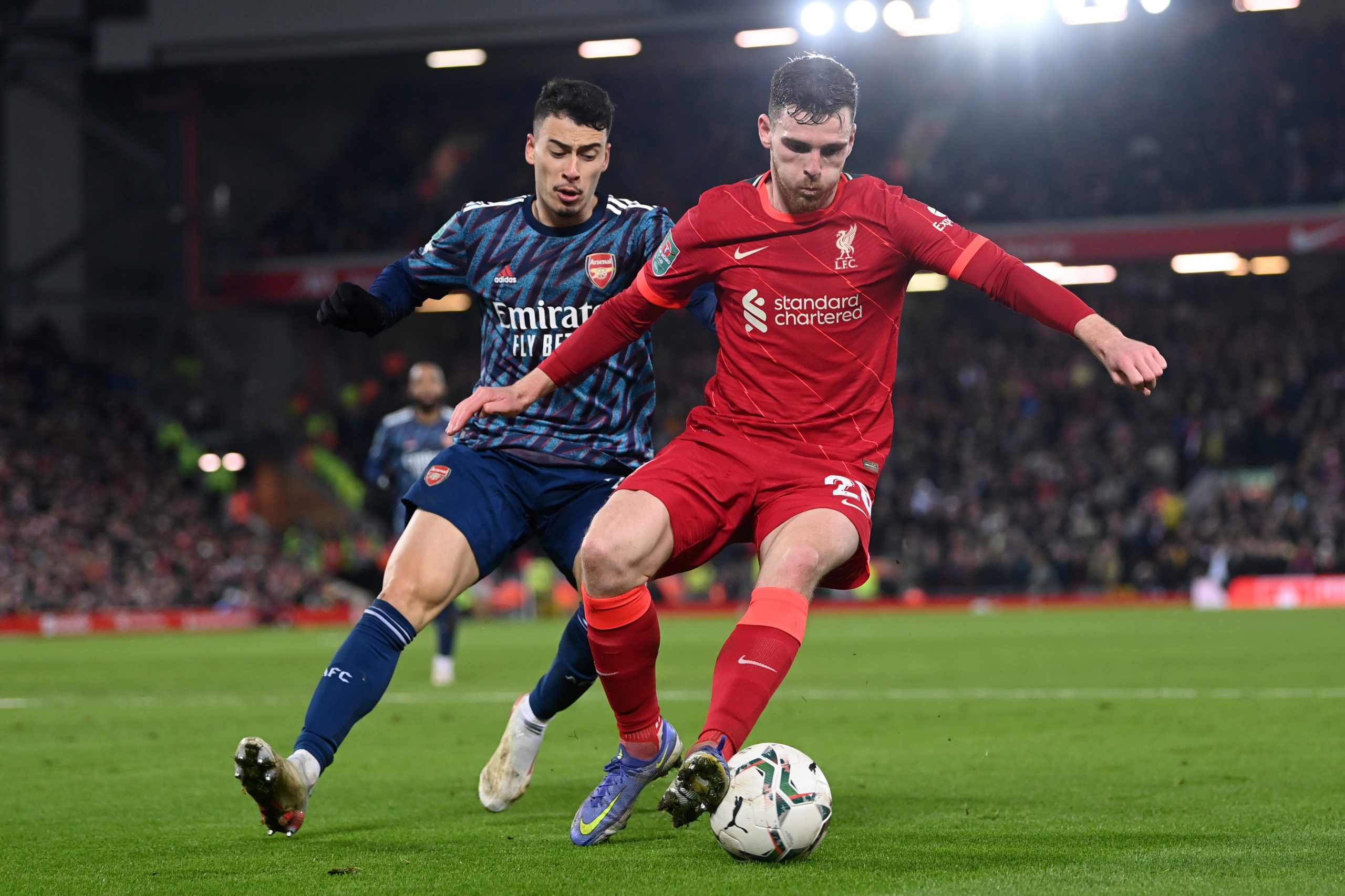 LIVERPOOL, ENGLAND - JANUARY 13: Andrew Robertson of Liverpool holds the ball up from Gabriel Martinelli of Arsenal during the Carabao Cup Semi Final First Leg match between Liverpool and Arsenal at Anfield on January 13, 2022 in Liverpool, England. (Photo by Michael Regan/Getty Images)The 4th Official uses images provided by the following image agency:
Getty Images (https://www.gettyimages.de/)
Imago Images (https://www.imago-images.de/)