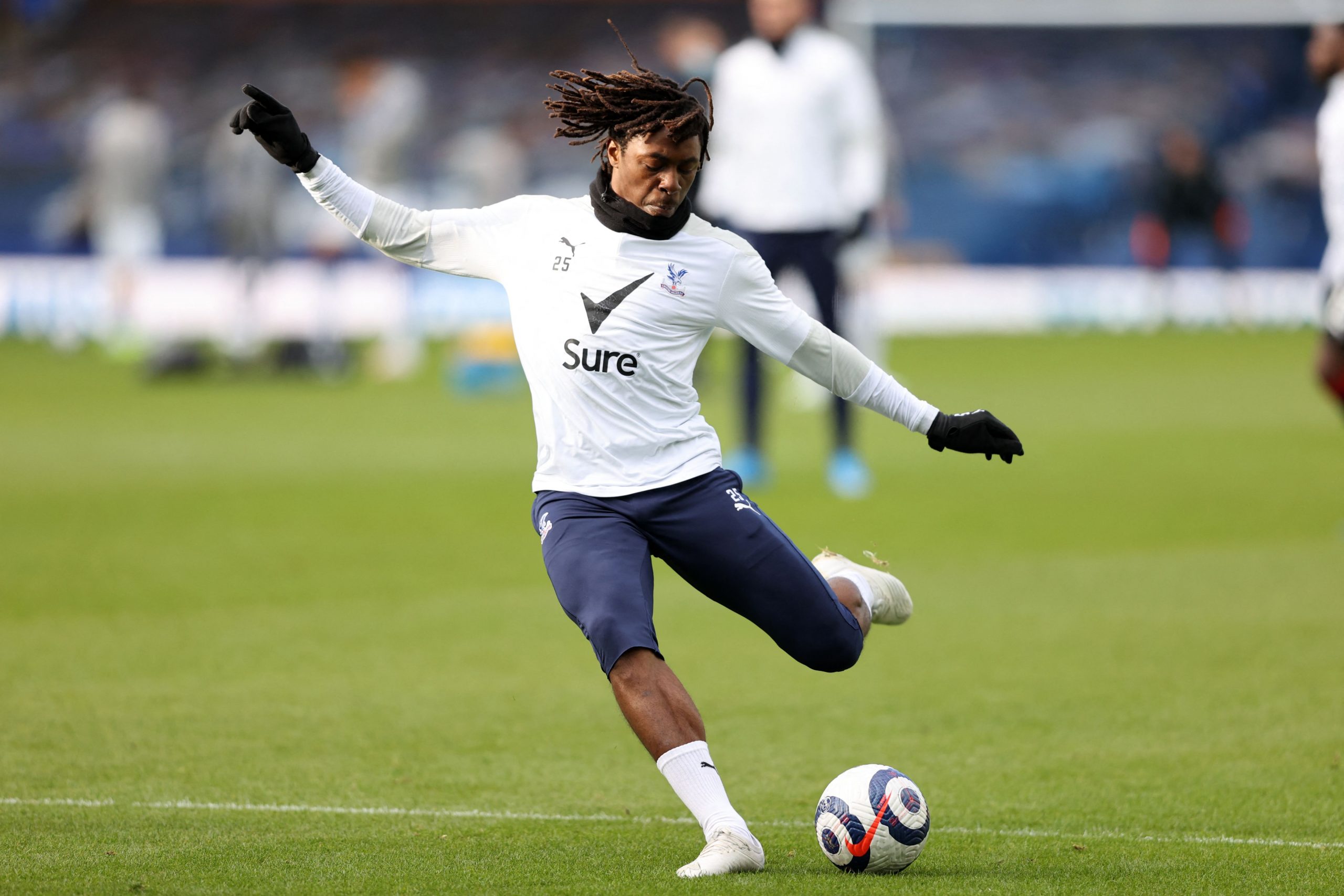 Crystal Palace's English midfielder Eberechi Eze warms up ahead of the English Premier League football match between Everton and Crystal Palace at Goodison Park in Liverpool, north west England on April 5, 2021. - RESTRICTED TO EDITORIAL USE. No use with unauthorized audio, video, data, fixture lists, club/league logos or 'live' services. Online in-match use limited to 120 images. An additional 40 images may be used in extra time. No video emulation. Social media in-match use limited to 120 images. An additional 40 images may be used in extra time. No use in betting publications, games or single club/league/player publications. (Photo by Clive Brunskill / POOL / AFP) / RESTRICTED TO EDITORIAL USE. No use with unauthorized audio, video, data, fixture lists, club/league logos or 'live' services. Online in-match use limited to 120 images. An additional 40 images may be used in extra time. No video emulation. Social media in-match use limited to 120 images. An additional 40 images may be used in extra time. No use in betting publications, games or single club/league/player publications. / RESTRICTED TO EDITORIAL USE. No use with unauthorized audio, video, data, fixture lists, club/league logos or 'live' services. Online in-match use limited to 120 images. An additional 40 images may be used in extra time. No video emulation. Social media in-match use limited to 120 images. An additional 40 images may be used in extra time. No use in betting publications, games or single club/league/player publications. (Photo by CLIVE BRUNSKILL/POOL/AFP via Getty Images)The 4th Official uses images provided by the following image agency: Getty Images (https://www.gettyimages.de/) and Imago Images (https://www.imago-images.de/).