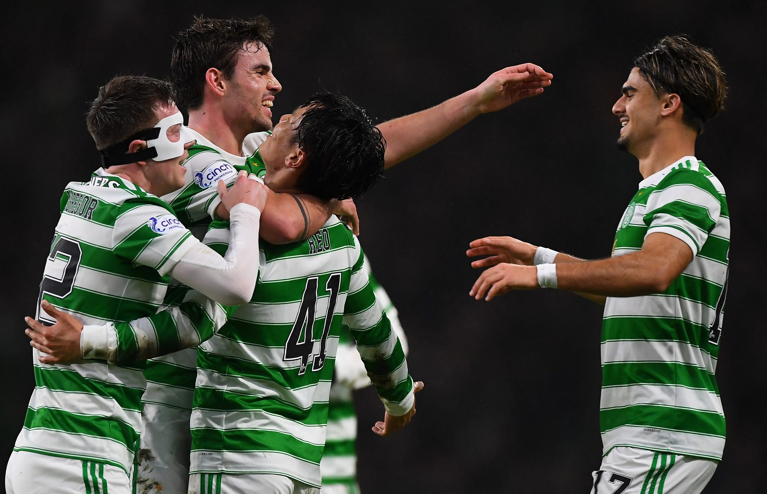 Celtic players celebrate a goal
