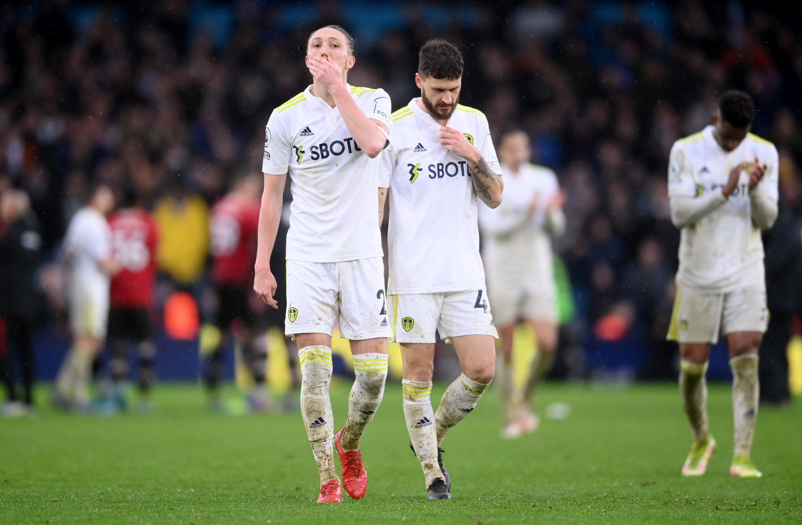 LEEDS, ENGLAND - FEBRUARY 20: Luke Ayling (L) and Mateusz Klich of Leeds United look dejected following defeat in the Premier League match between Leeds United and Manchester United at Elland Road on February 20, 2022 in Leeds, England. (Photo by Laurence Griffiths/Getty Images)The 4th Official uses images provided by the following image agency:
Getty Images (https://www.gettyimages.de/)
Imago Images (https://www.imago-images.de/)