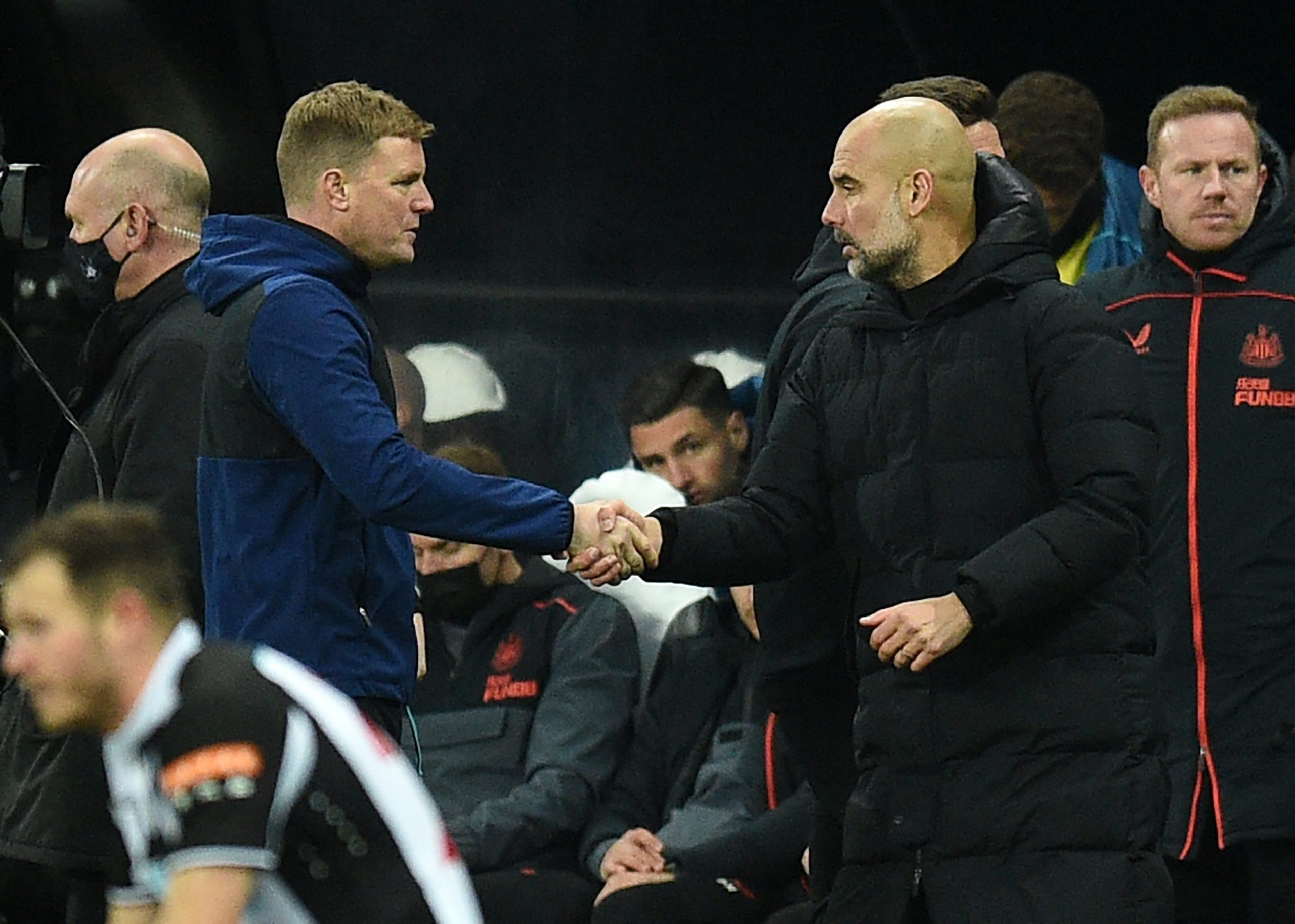 Eddie Howe - left and Pep Guardiola - right (Manchester City)