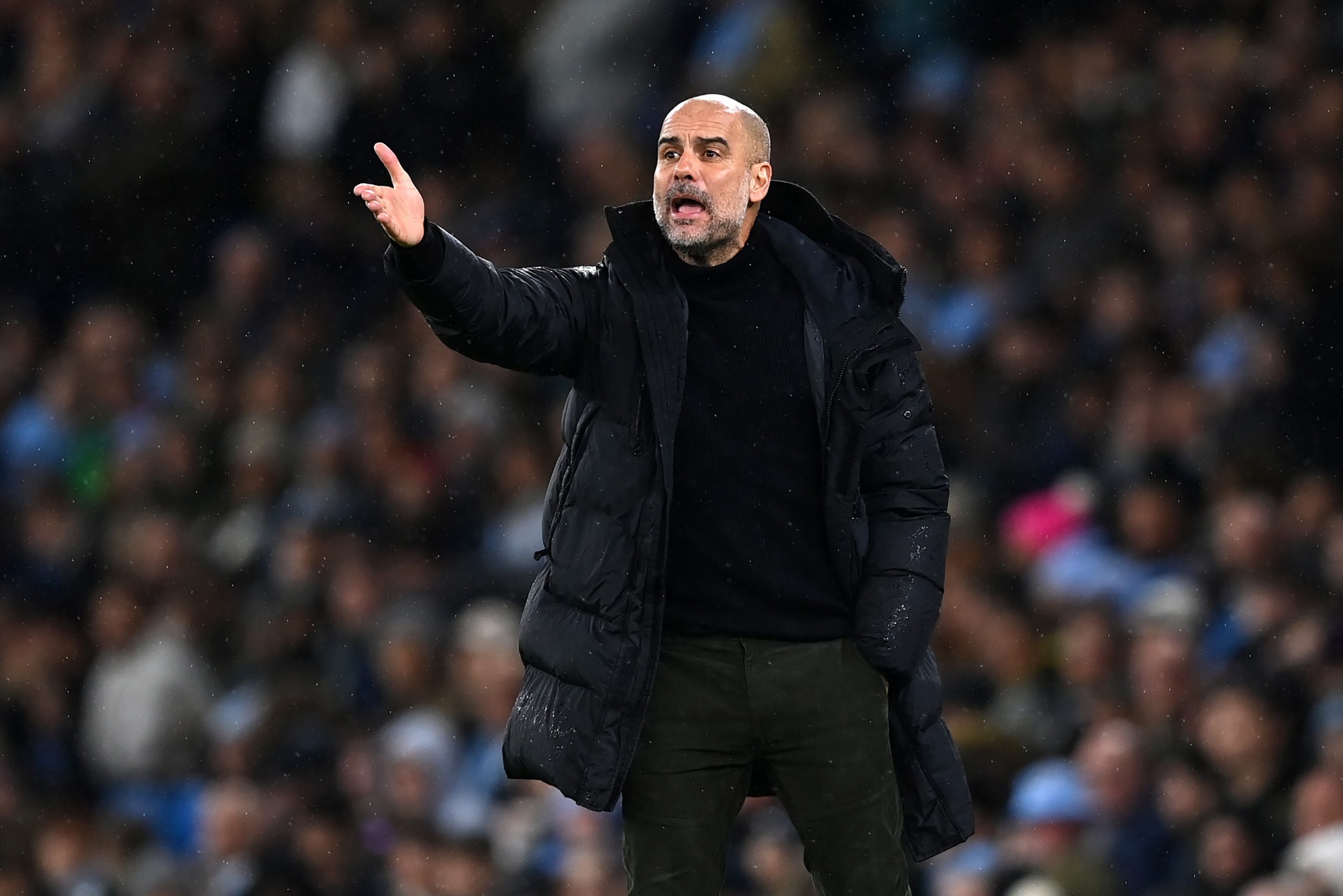 MANCHESTER, ENGLAND - MARCH 18: Pep Guardiola, Manager of Manchester City, looks on during the Emirates FA Cup Quarter Final match between Manchester City and Burnley at Etihad Stadium on March 18, 2023 in Manchester, England. (Photo by Michael Regan/Getty Images)