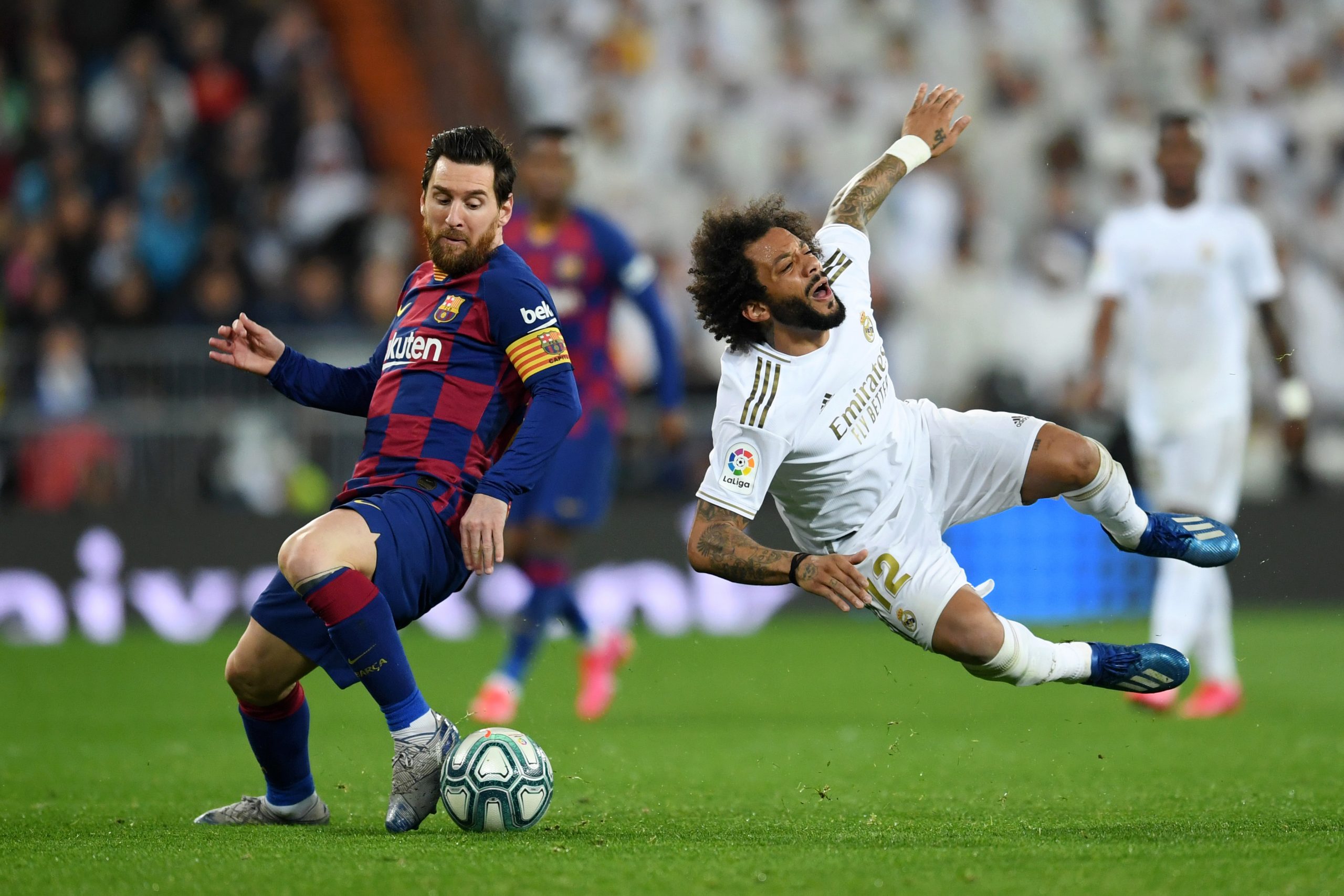 Lionel Messi and Marcelo going at each other during an El Clasico
