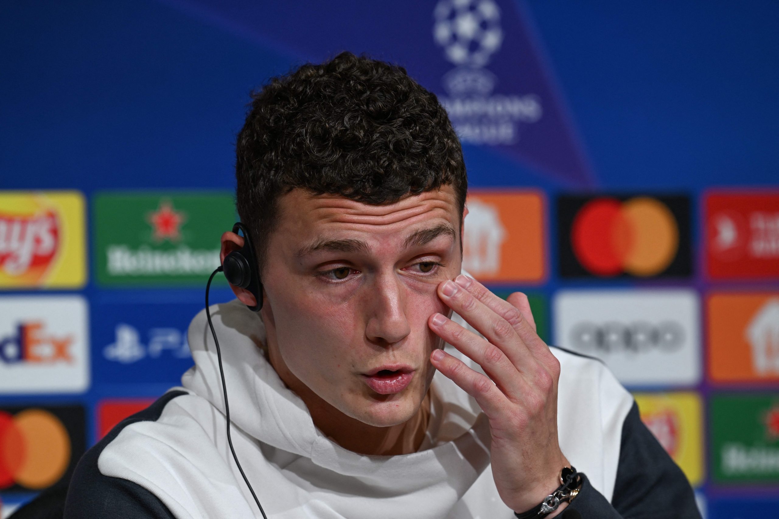 Bayern Munich's French defender Benjamin Pavard addresses a press conference on the eve of the UEFA Champions League quarter-final, second leg football match between Bayern Munich and Manchester City in Munich, southern Germany on April 18, 2023. (Photo by CHRISTOF STACHE / AFP) (Photo by CHRISTOF STACHE/AFP via Getty Images)