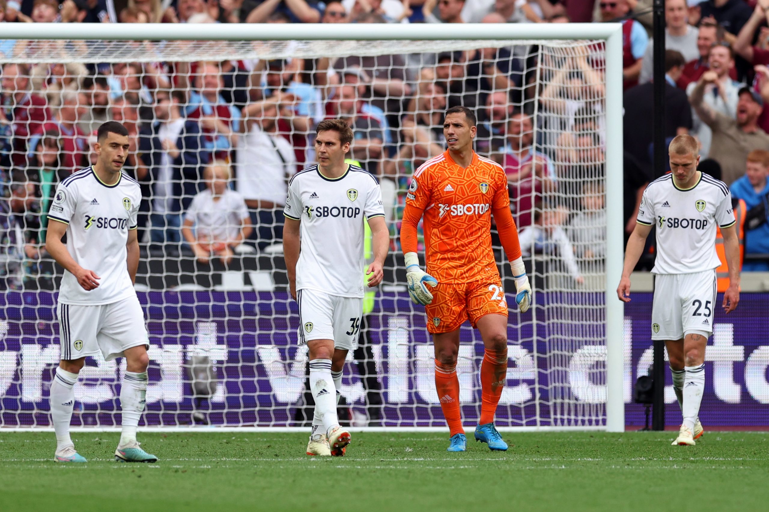 LONDON, ENGLAND - MAY 21: Marc Roca, Max Woeber, Joel Robles and Rasmus Kristensen of Leeds United look dejected after the West Ham United third goal during the Premier League match between West Ham United and Leeds United at London Stadium on May 21, 2023 in London, England. (Photo by Julian Finney/Getty Images)