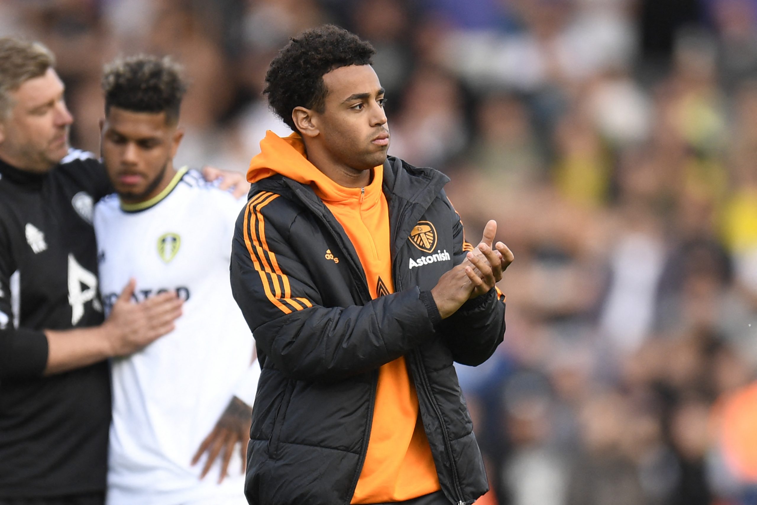 Leeds United's US midfielder Tyler Adams applauds fans on the pitch after the English Premier League football match between Leeds United and Tottenham Hotspur at Elland Road in Leeds, northern England on May 28, 2023. Tottenham won the game 4-1, Leeds are relegated to the Championship. (Photo by Oli SCARFF / AFP) / RESTRICTED TO EDITORIAL USE. No use with unauthorized audio, video, data, fixture lists, club/league logos or 'live' services. Online in-match use limited to 120 images. An additional 40 images may be used in extra time. No video emulation. Social media in-match use limited to 120 images. An additional 40 images may be used in extra time. No use in betting publications, games or single club/league/player publications. /  (Photo by OLI SCARFF/AFP via Getty Images)