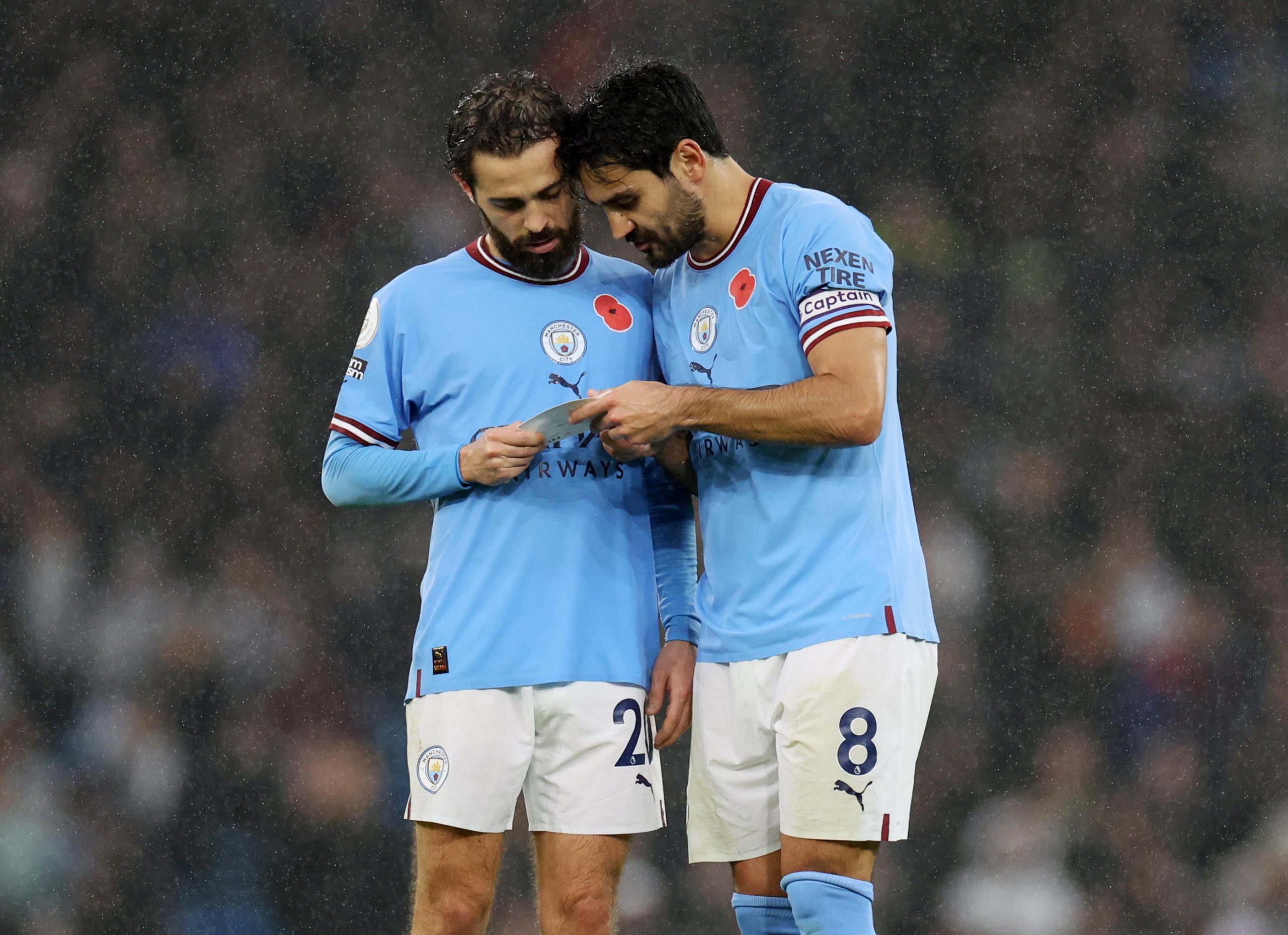 Ilkay Gundogan and Bernardo Silva of Manchester City