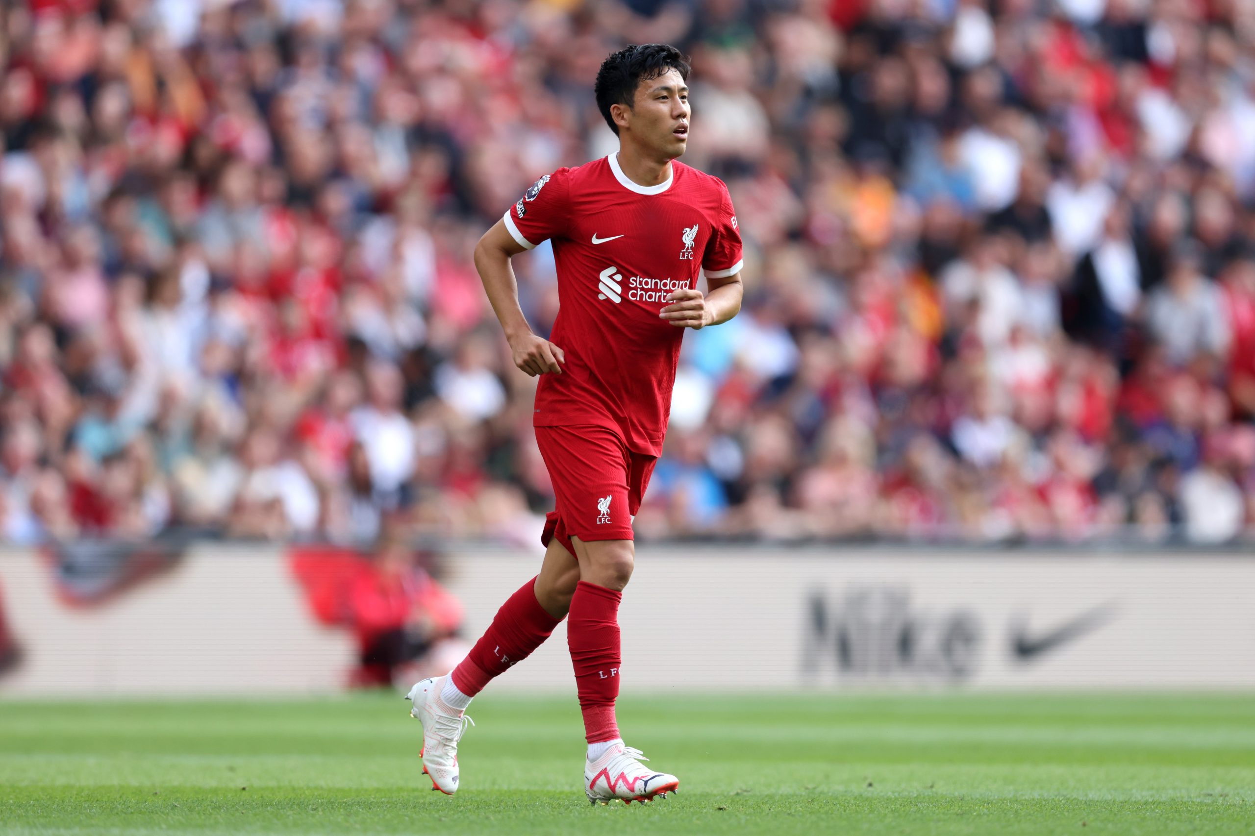 LIVERPOOL, ENGLAND - AUGUST 19: Wataru Endo of Liverpool looks on during the Premier League match between Liverpool FC and AFC Bournemouth at Anfield on August 19, 2023 in Liverpool, England. (Photo by George Wood/Getty Images)