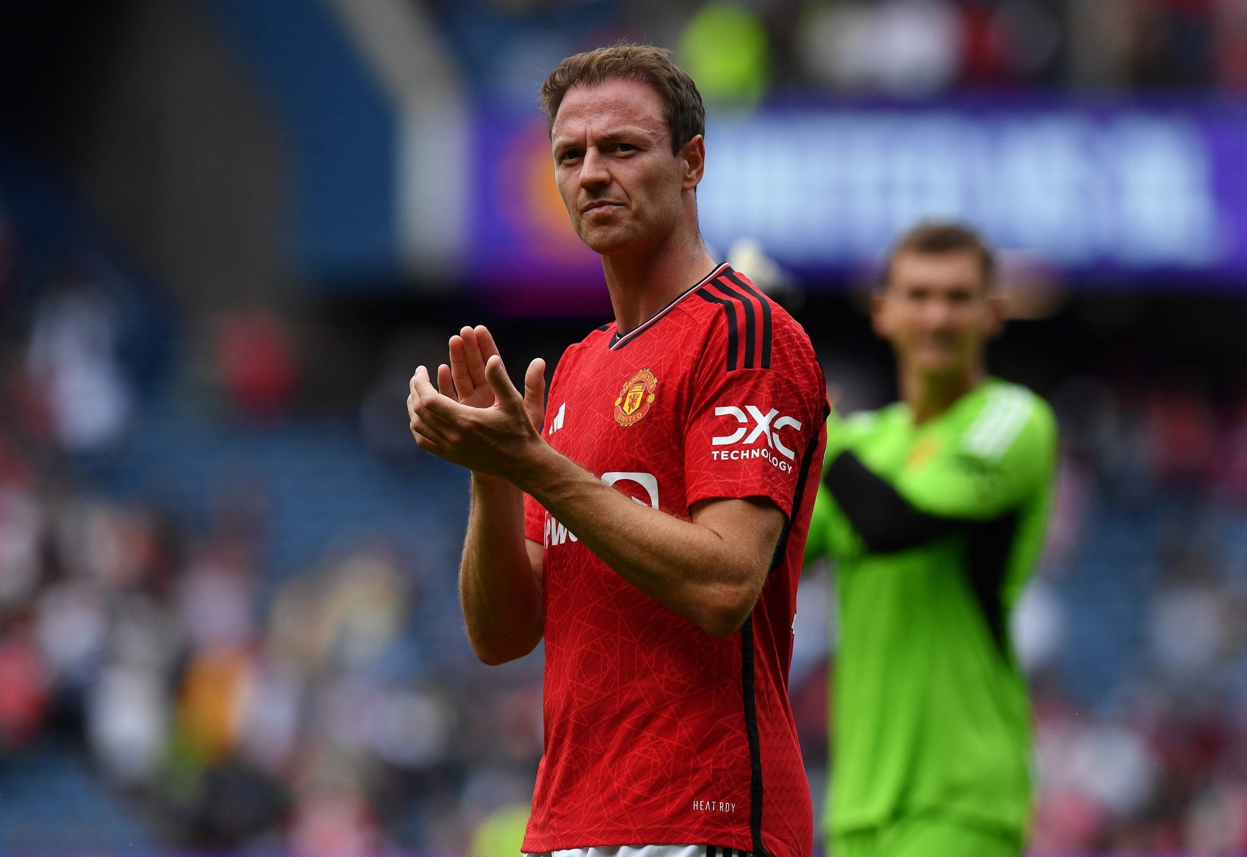 EDINBURGH, SCOTLAND - JULY 19: Jonny Evans of Manchester United applauds the crowd during the pre-season friendly match between Manchester United and Olympique Lyonnais at BT Murrayfield Stadium on July 19, 2023 in Edinburgh, Scotland. (Photo by Mark Runnacles/Getty Images)
