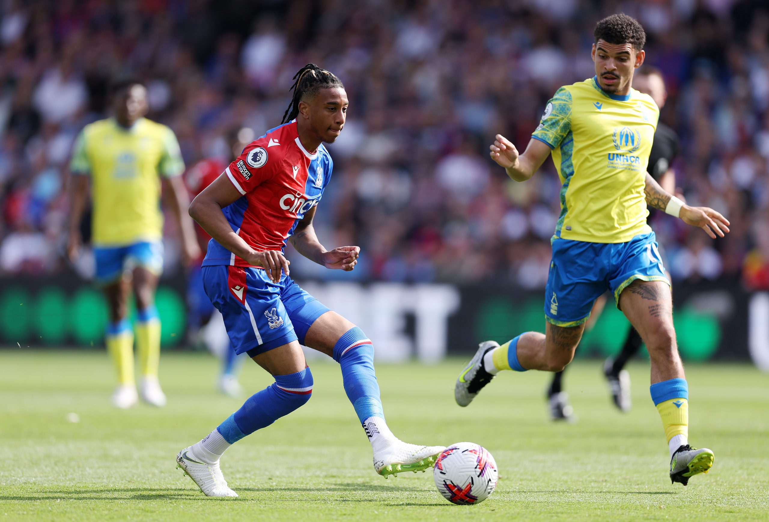 LONDON, ENGLAND - MAY 28: Michael Olise of Crystal Palace holds the ball whilst under pressure from Morgan Gibbs-White of Nottingham Forest during the Premier League match between Crystal Palace and Nottingham Forest at Selhurst Park on May 28, 2023 in London, England. (Photo by Richard Heathcote/Getty Images)