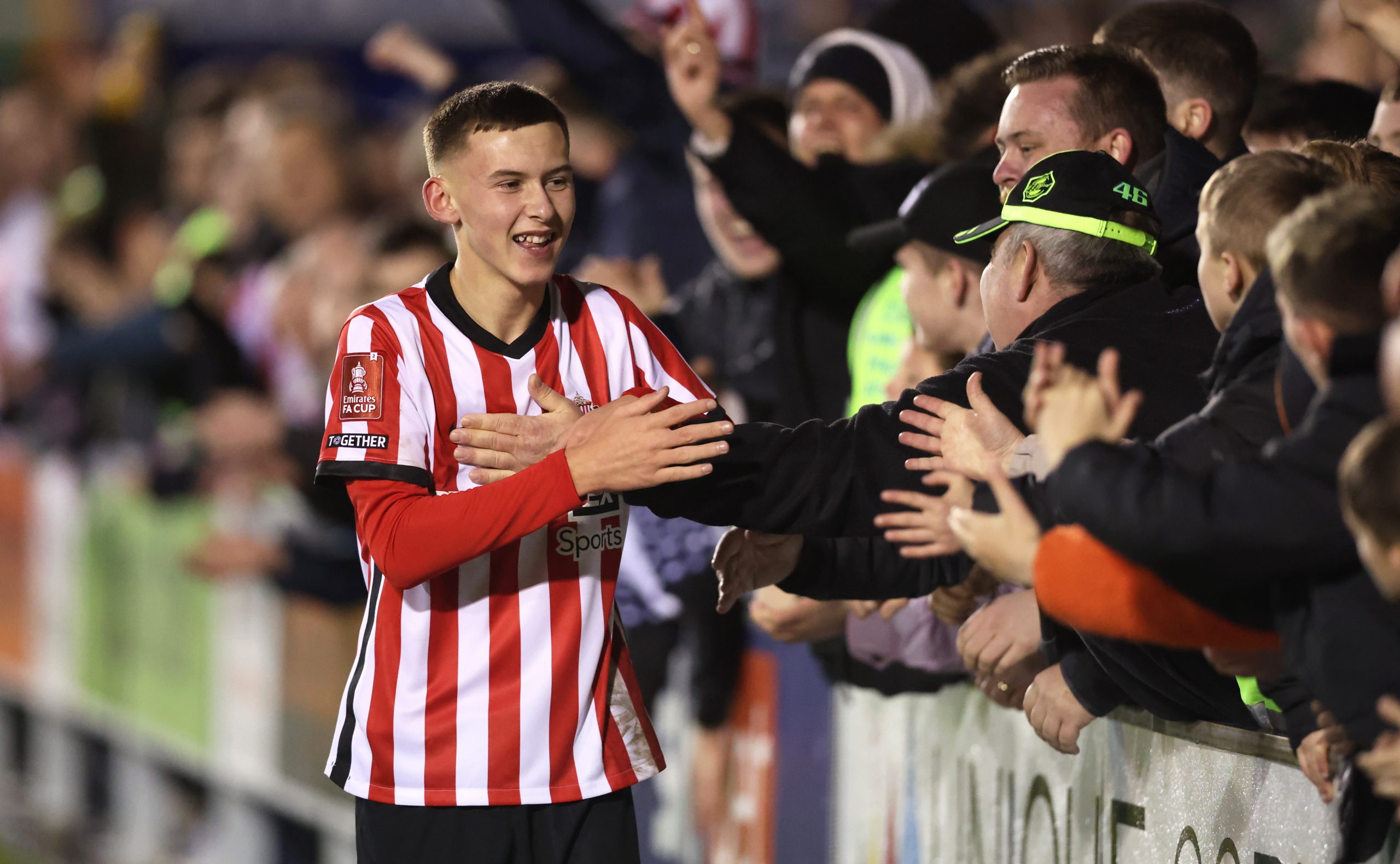 SHREWSBURY, ENGLAND - JANUARY 07: Chris Rigg of Sunderland interacts with the fans following the FA Cup Third Round match between Shrewsbury Town and Sunderland at Montgomery Waters Meadow on January 07, 2023 in Shrewsbury, England. (Photo by Nathan Stirk/Getty Images)