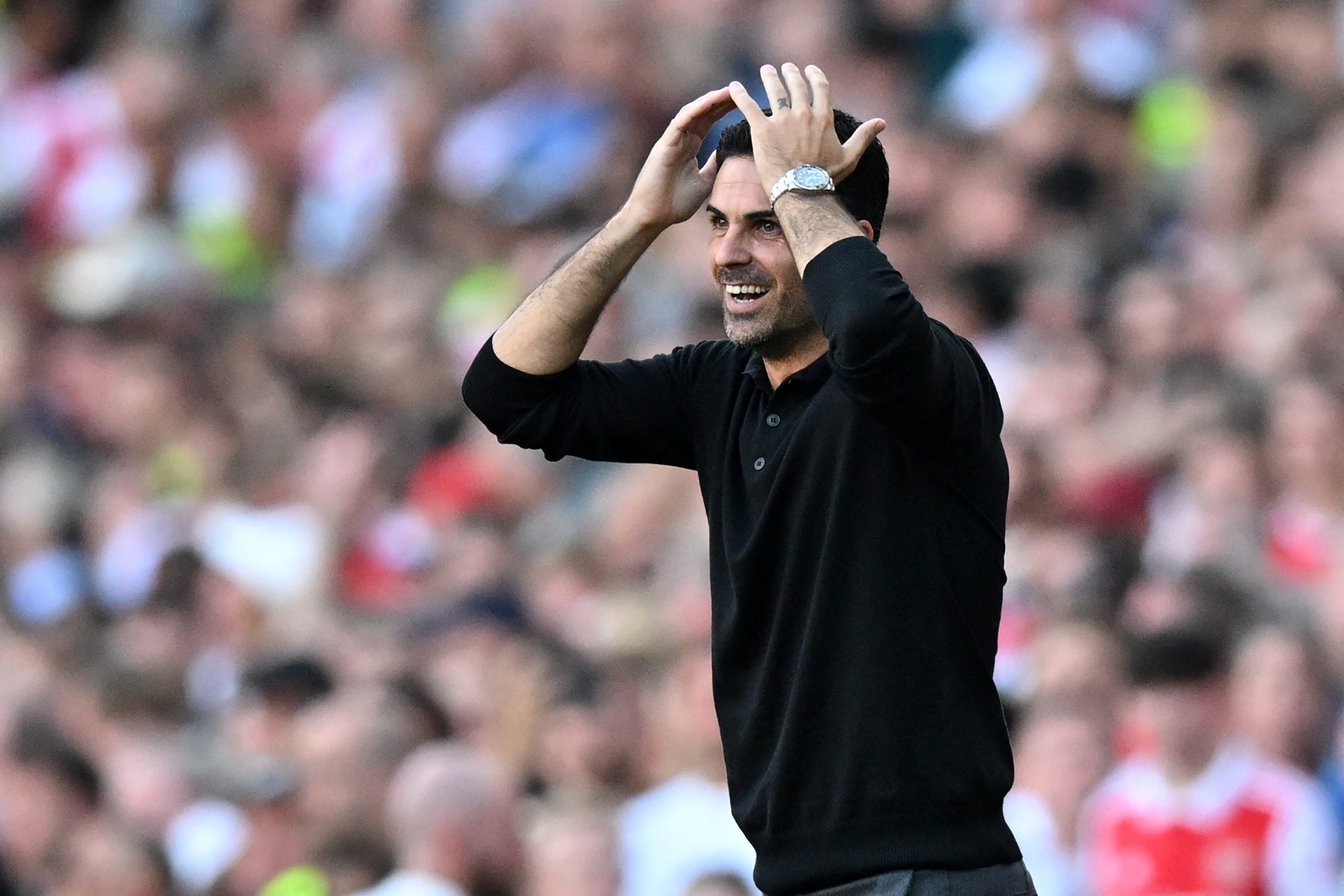 Arsenal's Spanish manager Mikel Arteta gestures on the touchline as a penalty decision is reviewed by the VAR (Video Assistant Referee) during the English Premier League football match between Arsenal and Manchester United at the Emirates Stadium in London on September 3, 2023. (Photo by Glyn KIRK / AFP) / RESTRICTED TO EDITORIAL USE. No use with unauthorized audio, video, data, fixture lists, club/league logos or 'live' services. Online in-match use limited to 120 images. An additional 40 images may be used in extra time. No video emulation. Social media in-match use limited to 120 images. An additional 40 images may be used in extra time. No use in betting publications, games or single club/league/player publications. /  (Photo by GLYN KIRK/AFP via Getty Images)