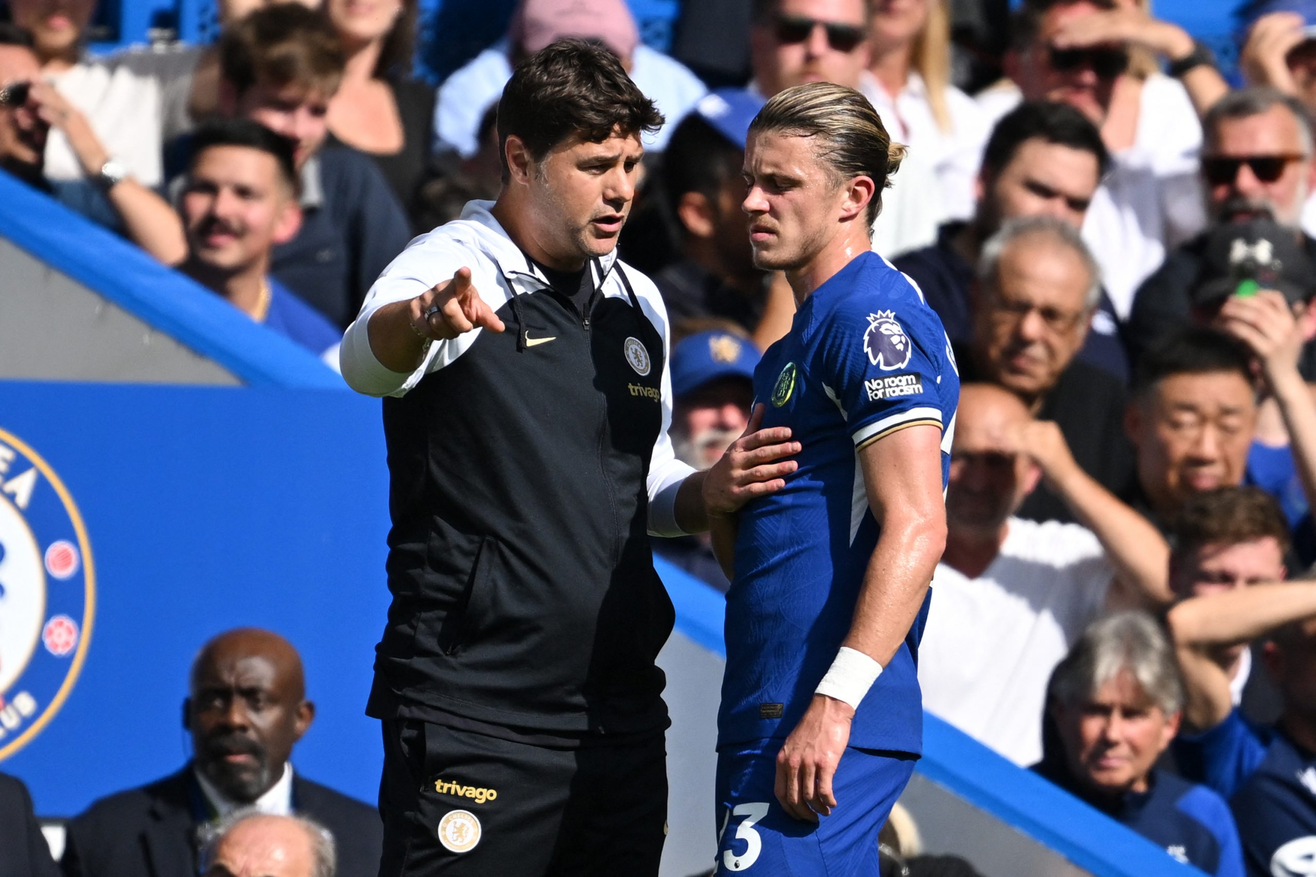 Chelsea's Argentinian head coach Mauricio Pochettino (L) speaks with Chelsea's English midfielder #23 Conor Gallagher (R) during the English Premier League football match between Chelsea and Nottingham Forest at Stamford Bridge in London on September 2, 2023. (Photo by JUSTIN TALLIS / AFP) / RESTRICTED TO EDITORIAL USE. No use with unauthorized audio, video, data, fixture lists, club/league logos or 'live' services. Online in-match use limited to 120 images. An additional 40 images may be used in extra time. No video emulation. Social media in-match use limited to 120 images. An additional 40 images may be used in extra time. No use in betting publications, games or single club/league/player publications. /  (Photo by JUSTIN TALLIS/AFP via Getty Images)