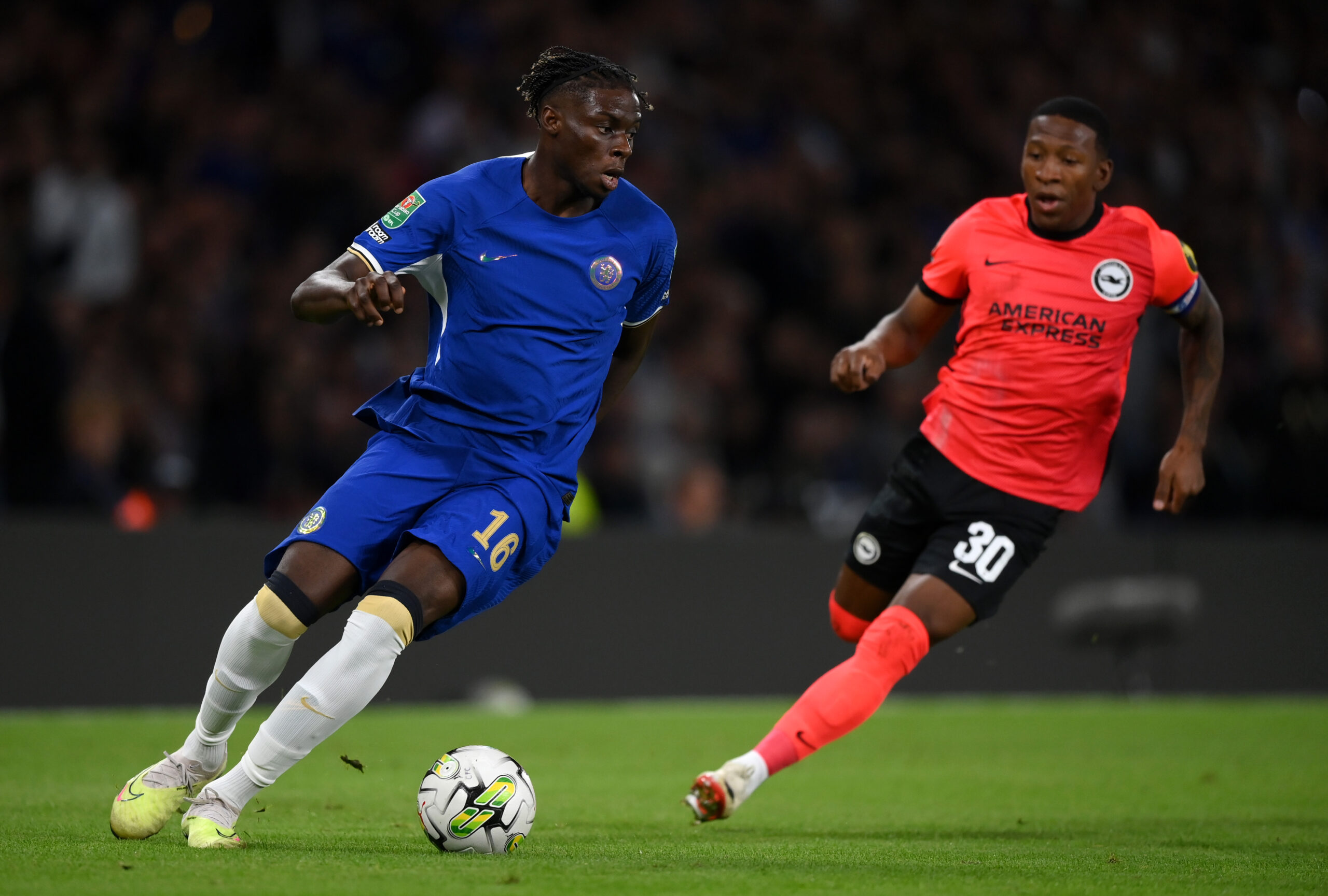 LONDON, ENGLAND - SEPTEMBER 27: Lesley Ugochukwu of Chelsea takes on Pervis Estupinan of Brighton & Hove Albion  during the Carabao Cup Third Round match between Chelsea and Brighton & Hove Albion at Stamford Bridge on September 27, 2023 in London, England. (Photo by Justin Setterfield/Getty Images)