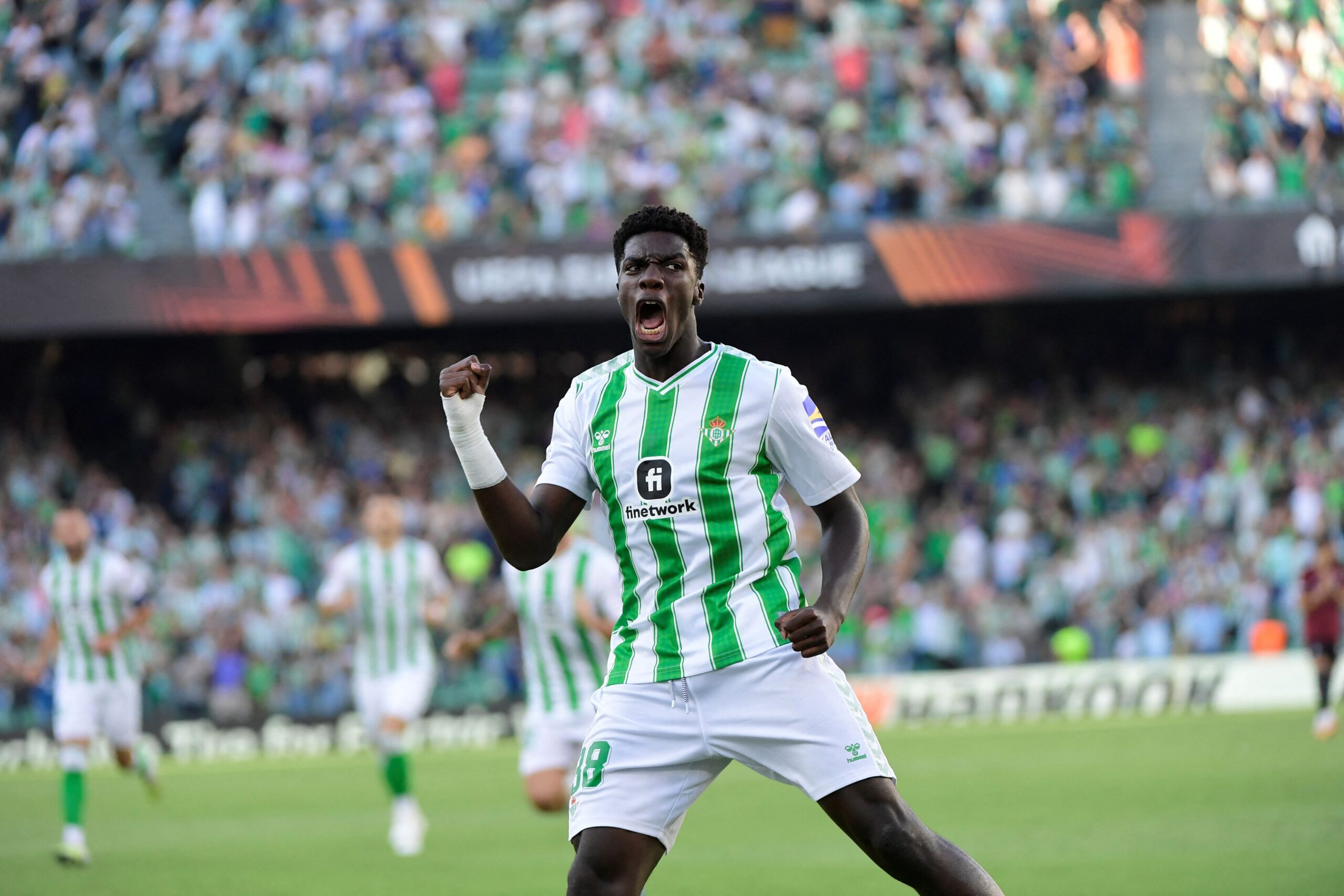 Real Betis' Spanish midfielder #38 Assane Diao celebrates scoring his team's first goal during the UEFA Europa League 1st round day 2 Group C football match between Real Betis and AC Sparta Praha at the Benito Villamarin stadium in Seville on October 5, 2023. (Photo by CRISTINA QUICLER / AFP) (Photo by CRISTINA QUICLER/AFP via Getty Images)