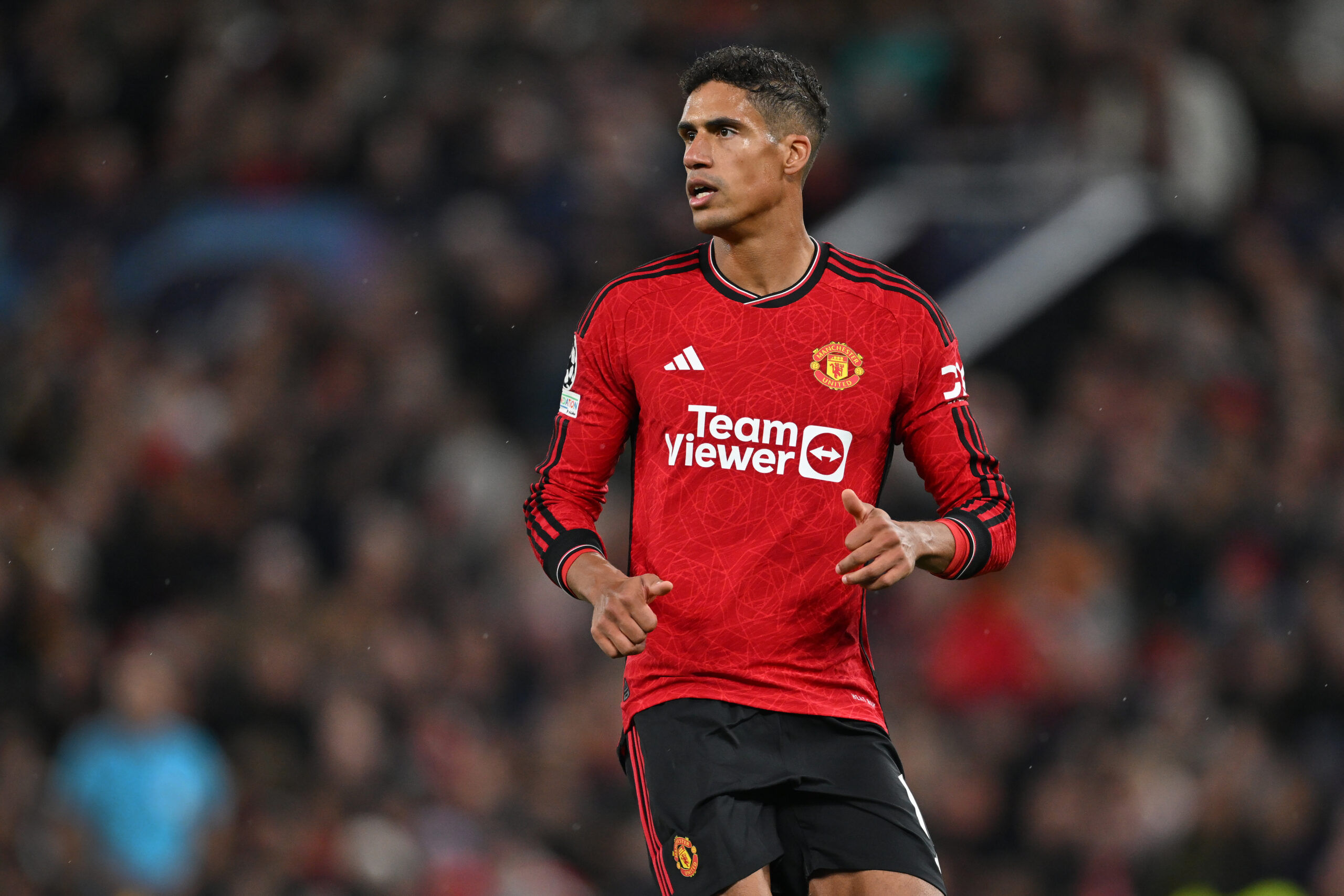 MANCHESTER, ENGLAND - OCTOBER 03: Raphael Varane of Manchester United looks on during the UEFA Champions League match between Manchester United and Galatasaray A.S at Old Trafford on October 03, 2023 in Manchester, England. (Photo by Michael Regan/Getty Images)