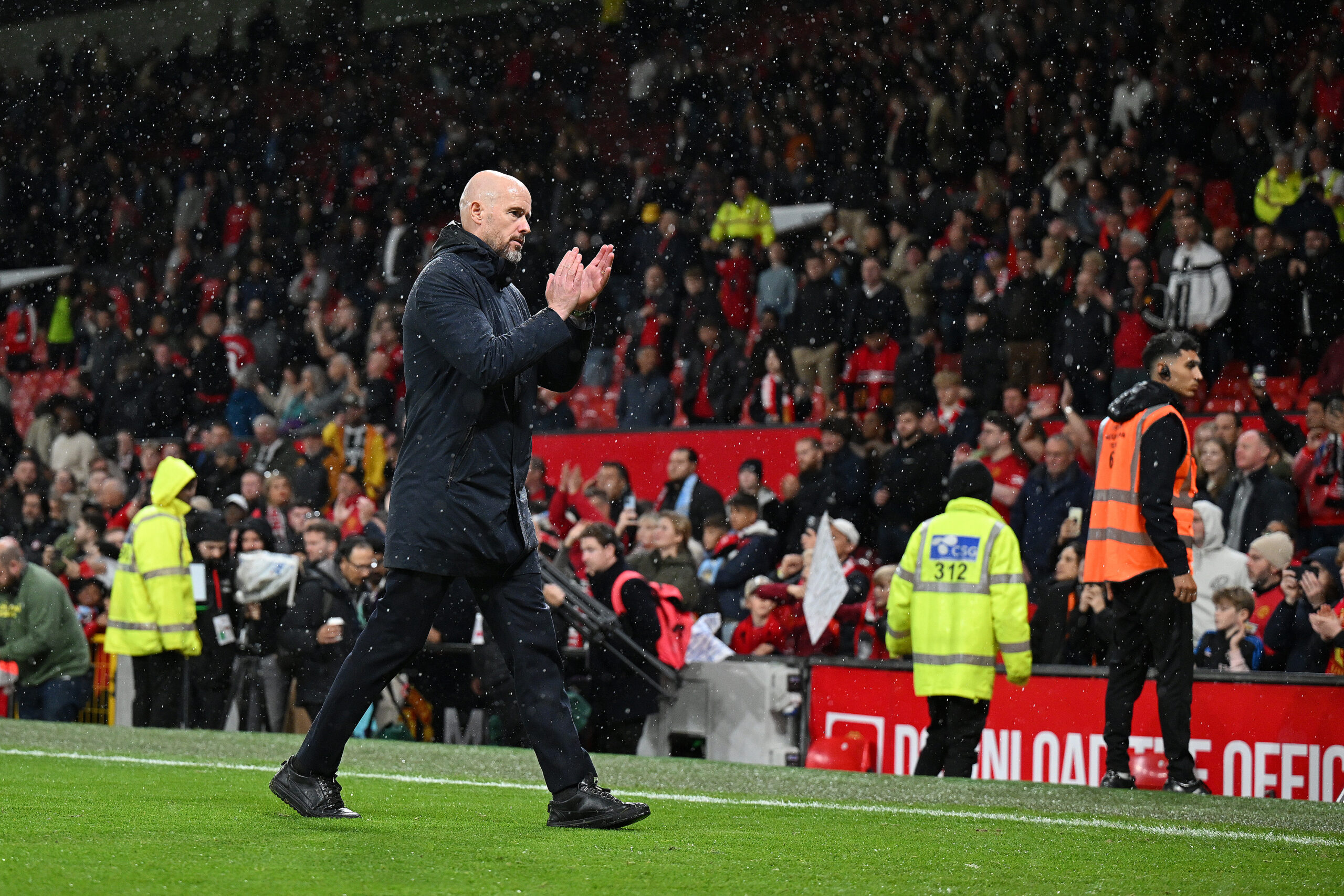 MANCHESTER, ENGLAND - OCTOBER 29: Erik ten Hag, Manager of Manchester United, applauds the fans after the team's defeat in the Premier League match between Manchester United and Manchester City at Old Trafford on October 29, 2023 in Manchester, England. (Photo by Michael Regan/Getty Images)