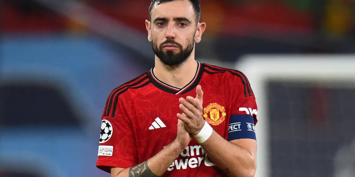 Manchester United's Portuguese midfielder #08 Bruno Fernandes reacts after the UEFA Champions League group A football match between Manchester United and FC Bayern Munich at Old Trafford stadium in Manchester, north west England, on December 12, 2023. (Photo by PETER POWELL / AFP) (Photo by PETER POWELL/AFP via Getty Images)