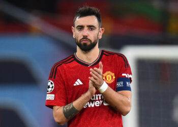Manchester United's Portuguese midfielder #08 Bruno Fernandes reacts after the UEFA Champions League group A football match between Manchester United and FC Bayern Munich at Old Trafford stadium in Manchester, north west England, on December 12, 2023. (Photo by PETER POWELL / AFP) (Photo by PETER POWELL/AFP via Getty Images)