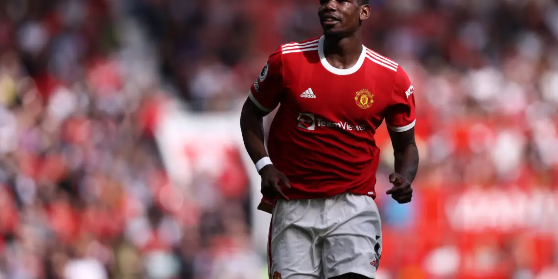 MANCHESTER, ENGLAND - APRIL 16: Paul Pogba of Manchester United in action during the Premier League match between Manchester United and Norwich City at Old Trafford on April 16, 2022 in Manchester, England. (Photo by Naomi Baker/Getty Images)