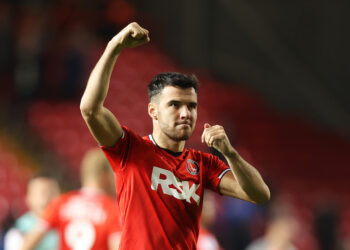 LONDON, ENGLAND - OCTOBER 17: Scott Fraser of Charlton Athletic celebrates victory following the Sky Bet League One match between Charlton Athletic and Portsmouth at The Valley on October 17, 2022 in London, England. (Photo by Alex Pantling/Getty Images)