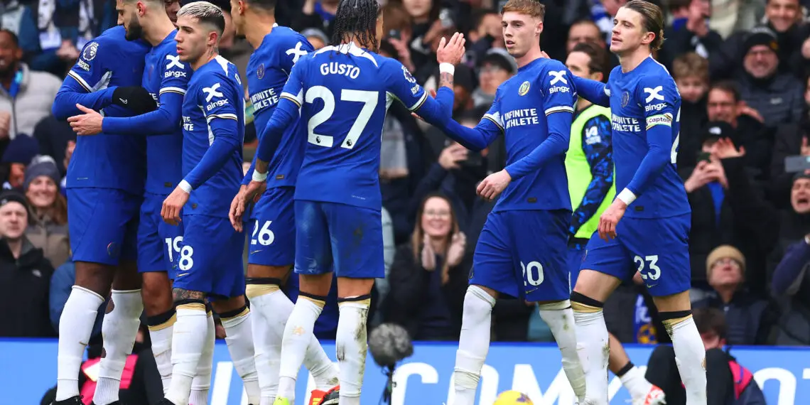 LONDON, ENGLAND - JANUARY 13: Cole Palmer of Chelsea celebrates with team mates after scoring their sides first goal from the penalty spot during the Premier League match between Chelsea FC and Fulham FC at Stamford Bridge on January 13, 2024 in London, England. (Photo by Clive Rose/Getty Images)