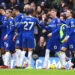 LONDON, ENGLAND - JANUARY 13: Cole Palmer of Chelsea celebrates with team mates after scoring their sides first goal from the penalty spot during the Premier League match between Chelsea FC and Fulham FC at Stamford Bridge on January 13, 2024 in London, England. (Photo by Clive Rose/Getty Images)