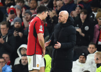 Manchester United's English defender #05 Harry Maguire leaves the pitch following an injury during the UEFA Champions League group A football match between Manchester United and FC Bayern Munich at Old Trafford stadium in Manchester, north west England, on December 12, 2023. (Photo by PETER POWELL / AFP) (Photo by PETER POWELL/AFP via Getty Images)