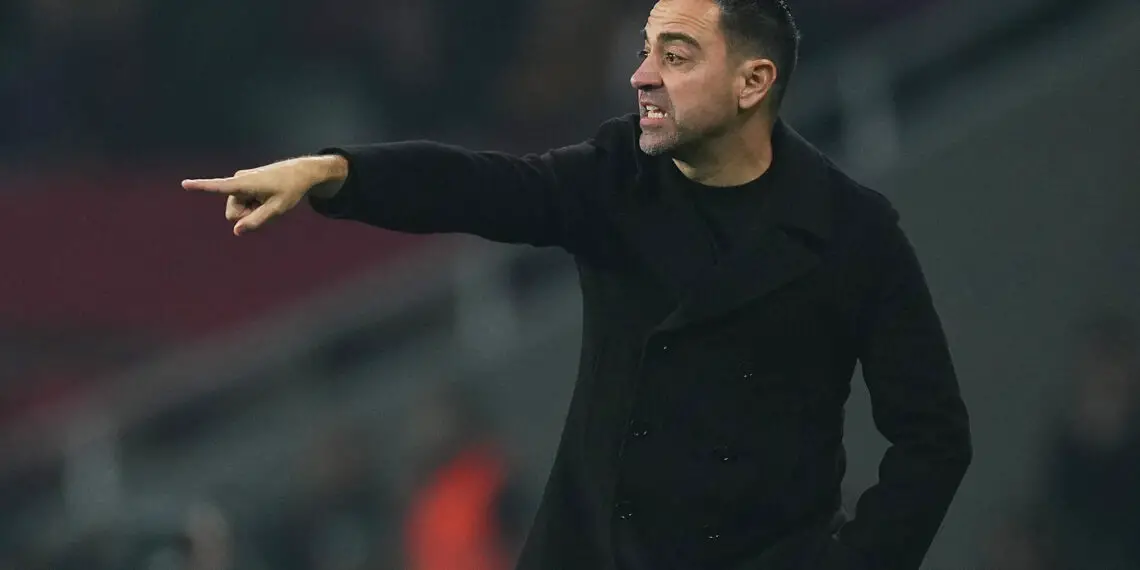 BARCELONA, SPAIN - JANUARY 27: Xavi, Head Coach of FC Barcelona, gives the team instructions during the LaLiga EA Sports match between FC Barcelona and Villarreal CF at Estadi Olimpic Lluis Companys on January 27, 2024 in Barcelona, Spain. (Photo by Alex Caparros/Getty Images)