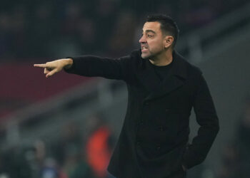 BARCELONA, SPAIN - JANUARY 27: Xavi, Head Coach of FC Barcelona, gives the team instructions during the LaLiga EA Sports match between FC Barcelona and Villarreal CF at Estadi Olimpic Lluis Companys on January 27, 2024 in Barcelona, Spain. (Photo by Alex Caparros/Getty Images)