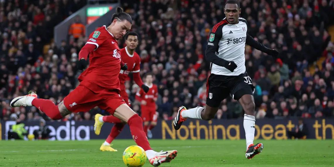 LIVERPOOL, ENGLAND - JANUARY 10: Darwin Nunez of Liverpool shoots during the Carabao Cup Semi Final First Leg match between Liverpool and Fulham at Anfield on January 10, 2024 in Liverpool, England. (Photo by Clive Brunskill/Getty Images)