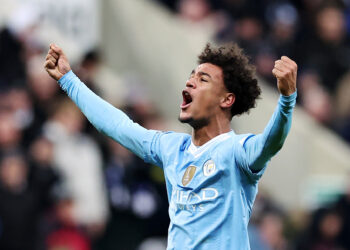 NEWCASTLE UPON TYNE, ENGLAND - JANUARY 13: Oscar Bobb of Manchester City celebrates after the team's victory in the Premier League match between Newcastle United and Manchester City at St. James Park on January 13, 2024 in Newcastle upon Tyne, England. (Photo by Alex Livesey/Getty Images)
