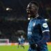 TOPSHOT - Feyenoord's Gambian forward #19 Yankuba Minteh celebrates after scoring his team first goal during the UEFA Champions League group E football match between Celtic and Feyenoord at Celtic Park stadium in Glasgow on December 13, 2023. (Photo by ANDY BUCHANAN / AFP) (Photo by ANDY BUCHANAN/AFP via Getty Images)