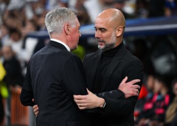 Carlo Ancelotti, Head Coach of Real Madrid, and Pep Guardiola, Manager of Manchester City