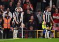 MANCHESTER, ENGLAND - MAY 15: Anthony Gordon of Newcastle United celebrates scoring his team's first goal during the Premier League match between Manchester United and Newcastle United at Old Trafford on May 15, 2024 in Manchester, England. (Photo by Stu Forster/Getty Images)