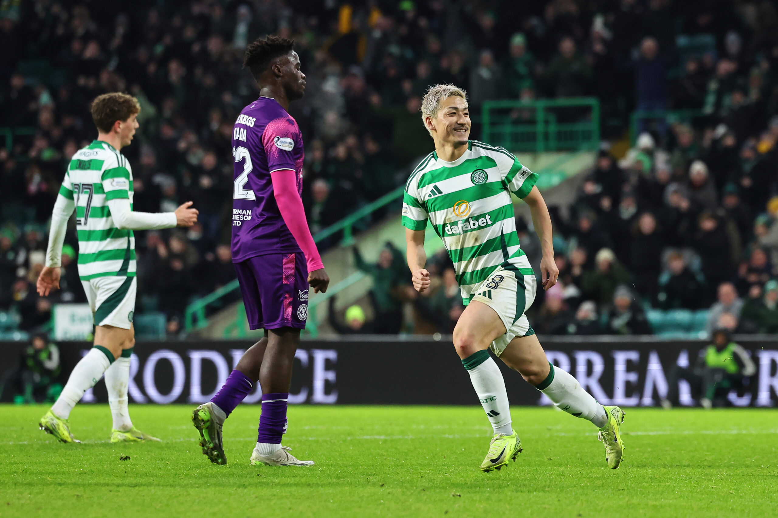 Celtic attacker Daizen Maeda celebrates a goal