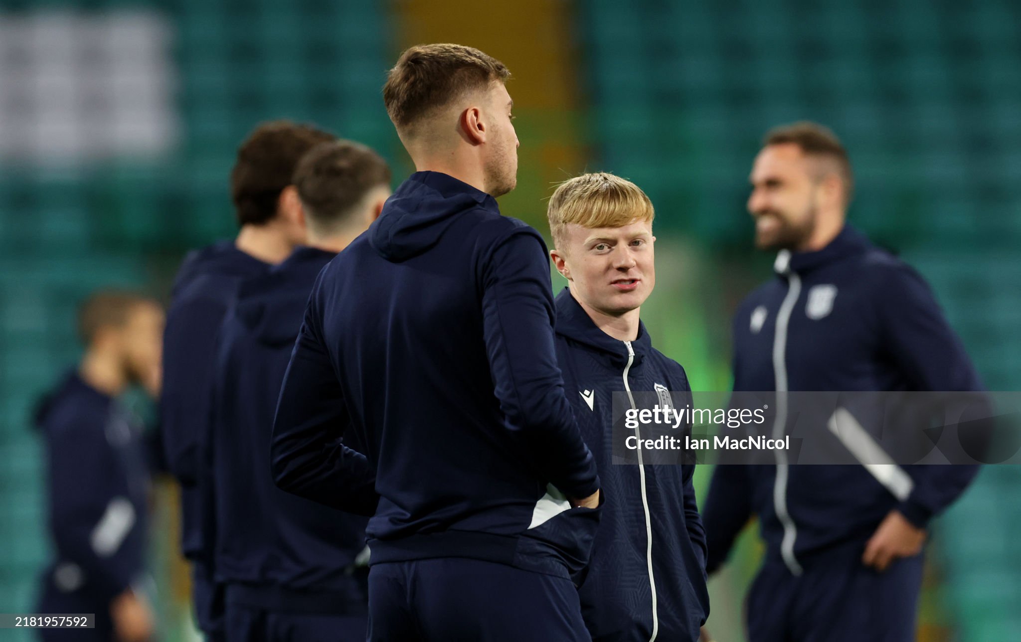 Rangers target Lyall Cameron is on a pitch inspection before Dundee's game against Celtic