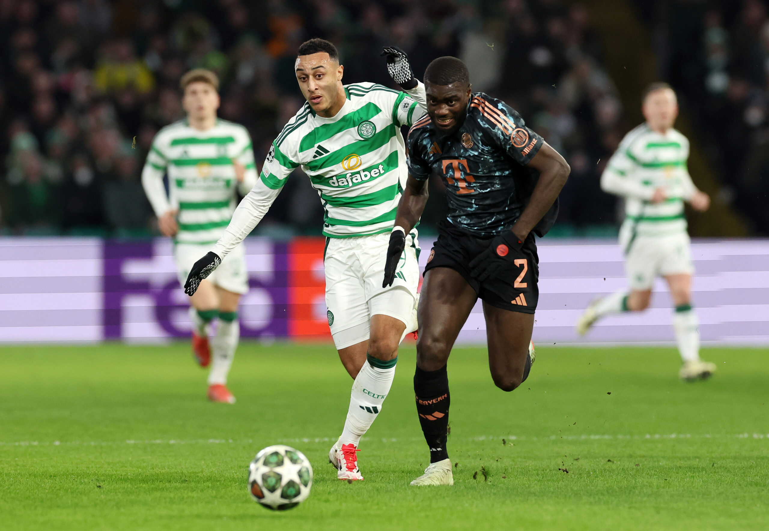 Celtic striker Adam Idah in action against Bayern Munich