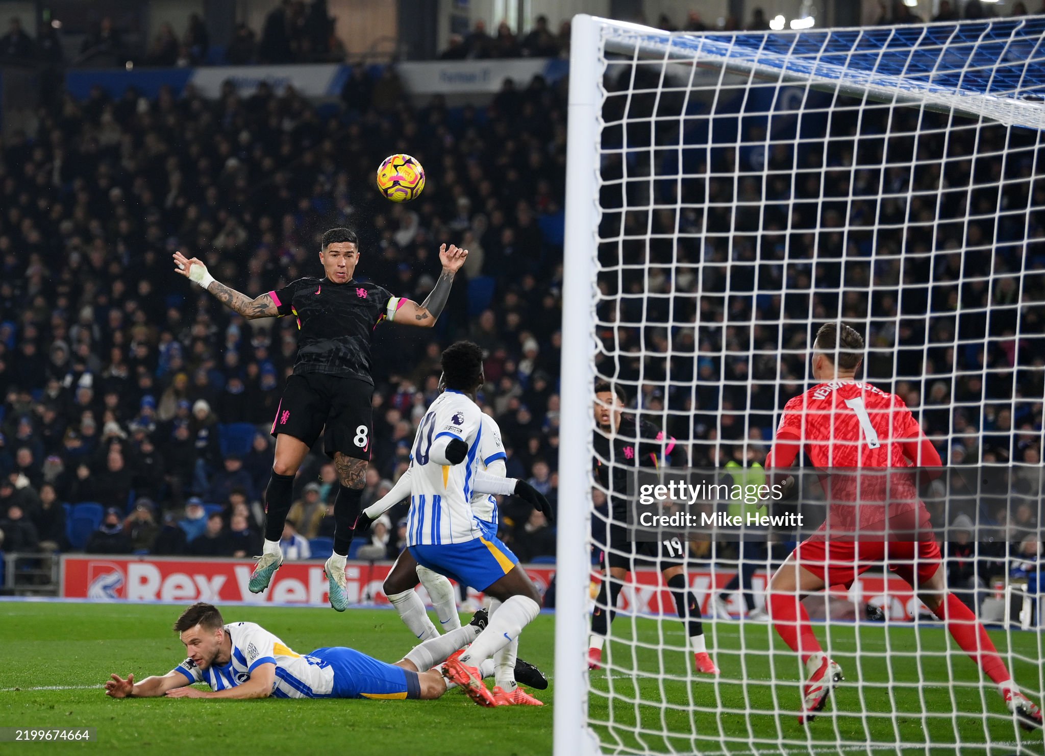 Chelsea skipper Enzo Fernandez attempts a header