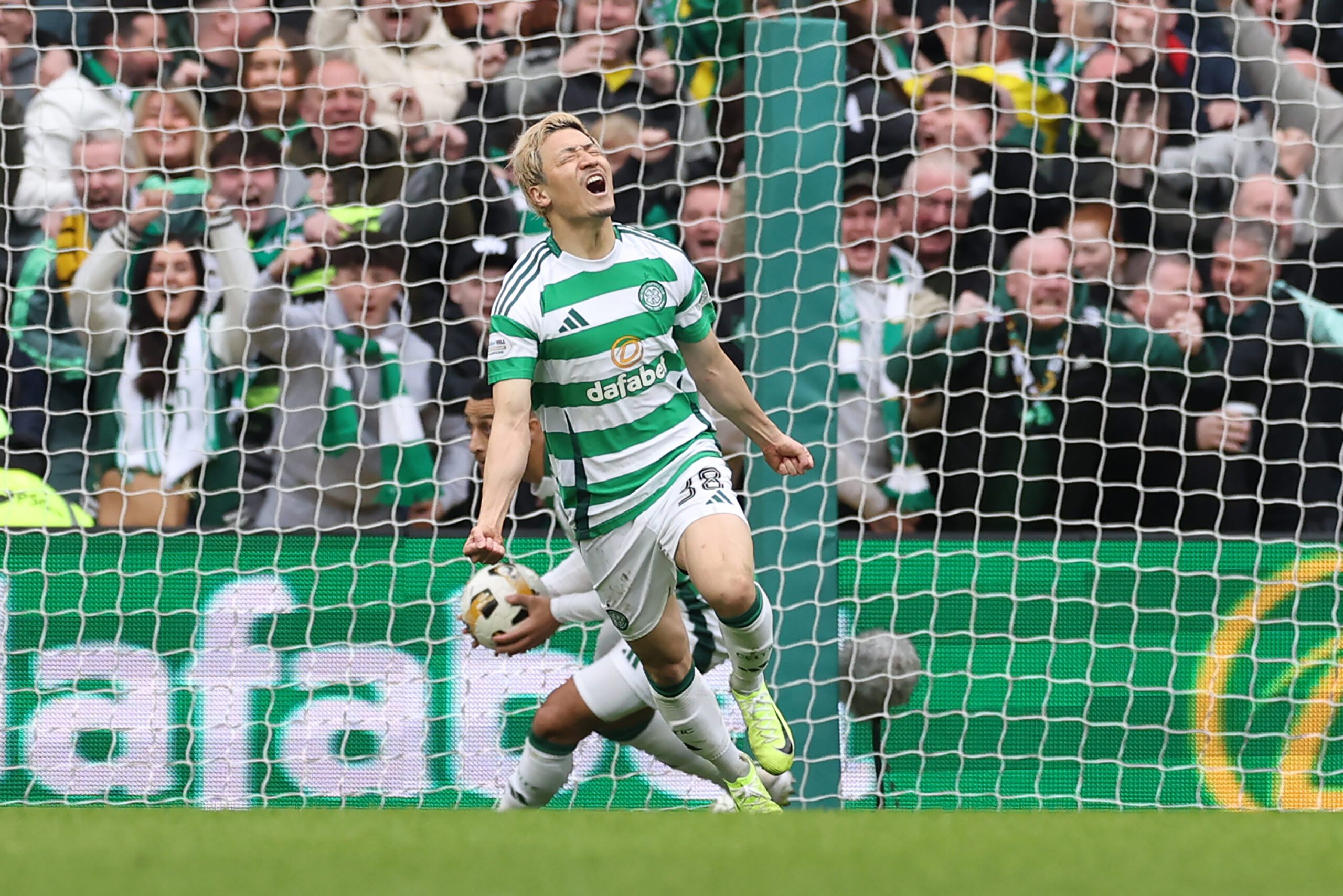 Celtic forward Daizen Maeda celebrates his goal against Rangers