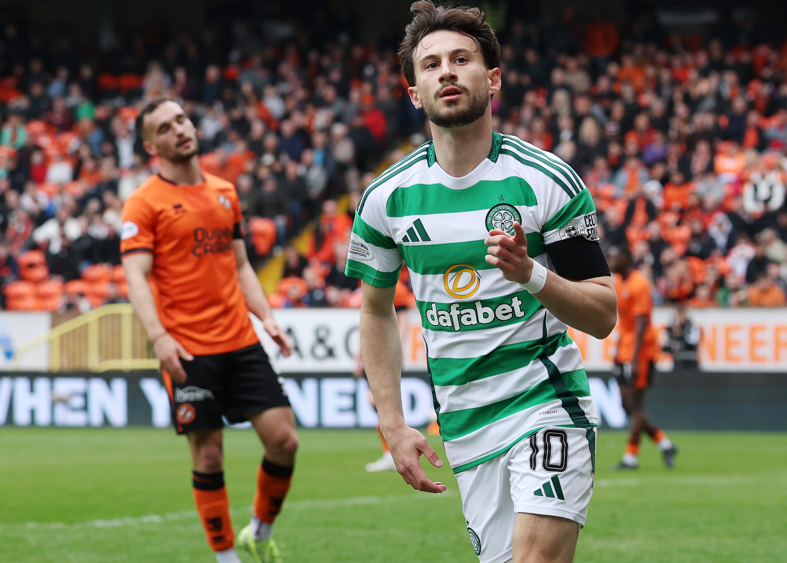 Celtic winger Nicolas Kuhn celebrates his goal