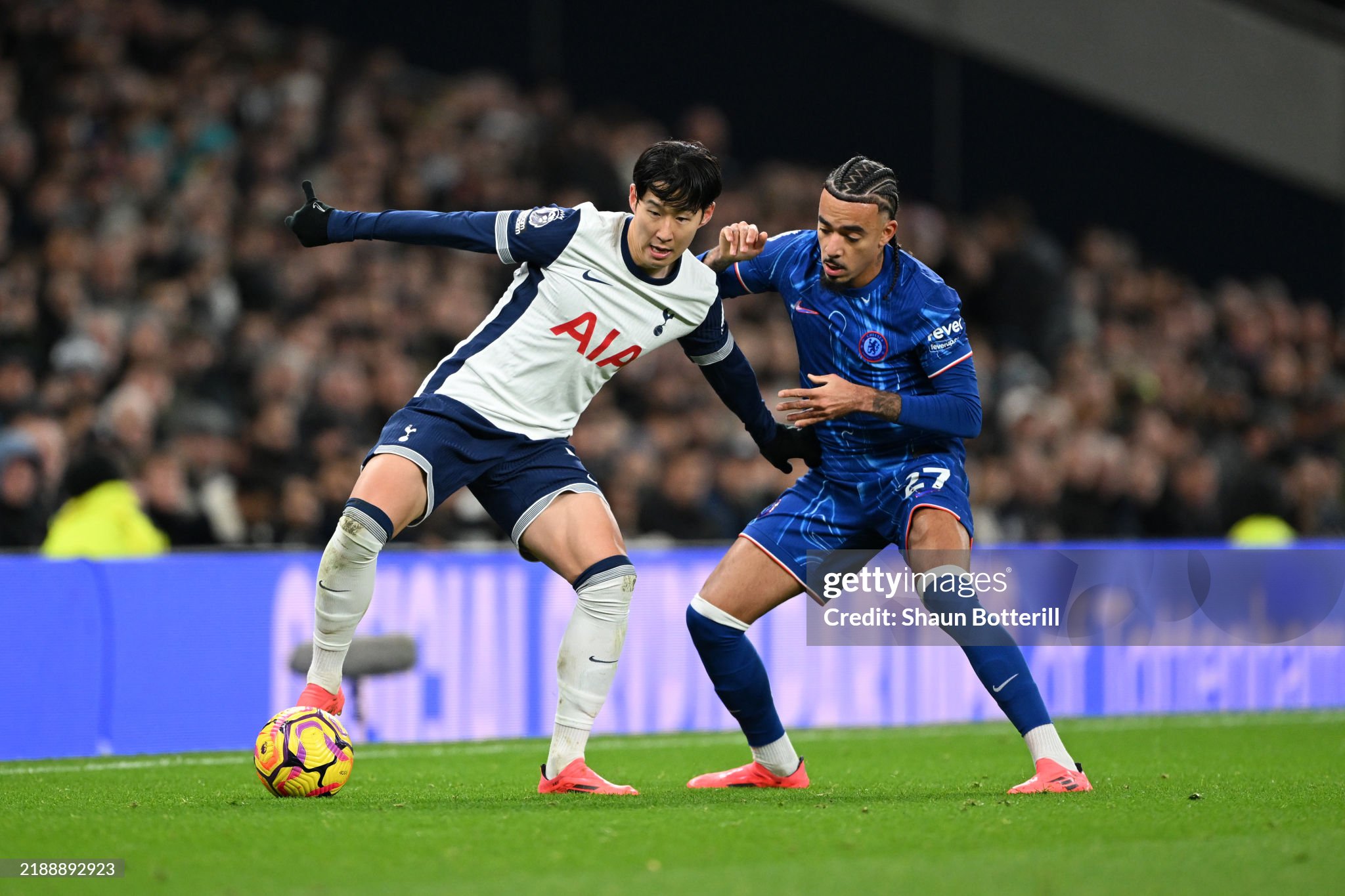 Tottenham skipper Son fighting for possession against Chelsea fullback Gusto