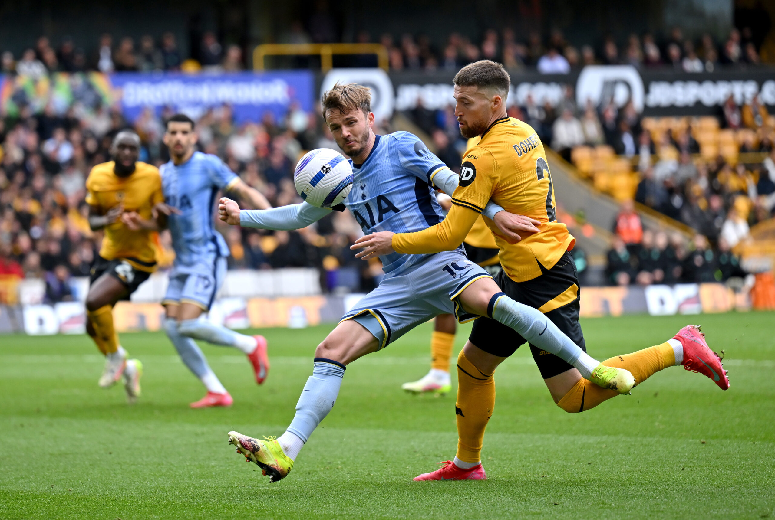 Tottenham Hotspur midfielder James Maddison in action against Wolves