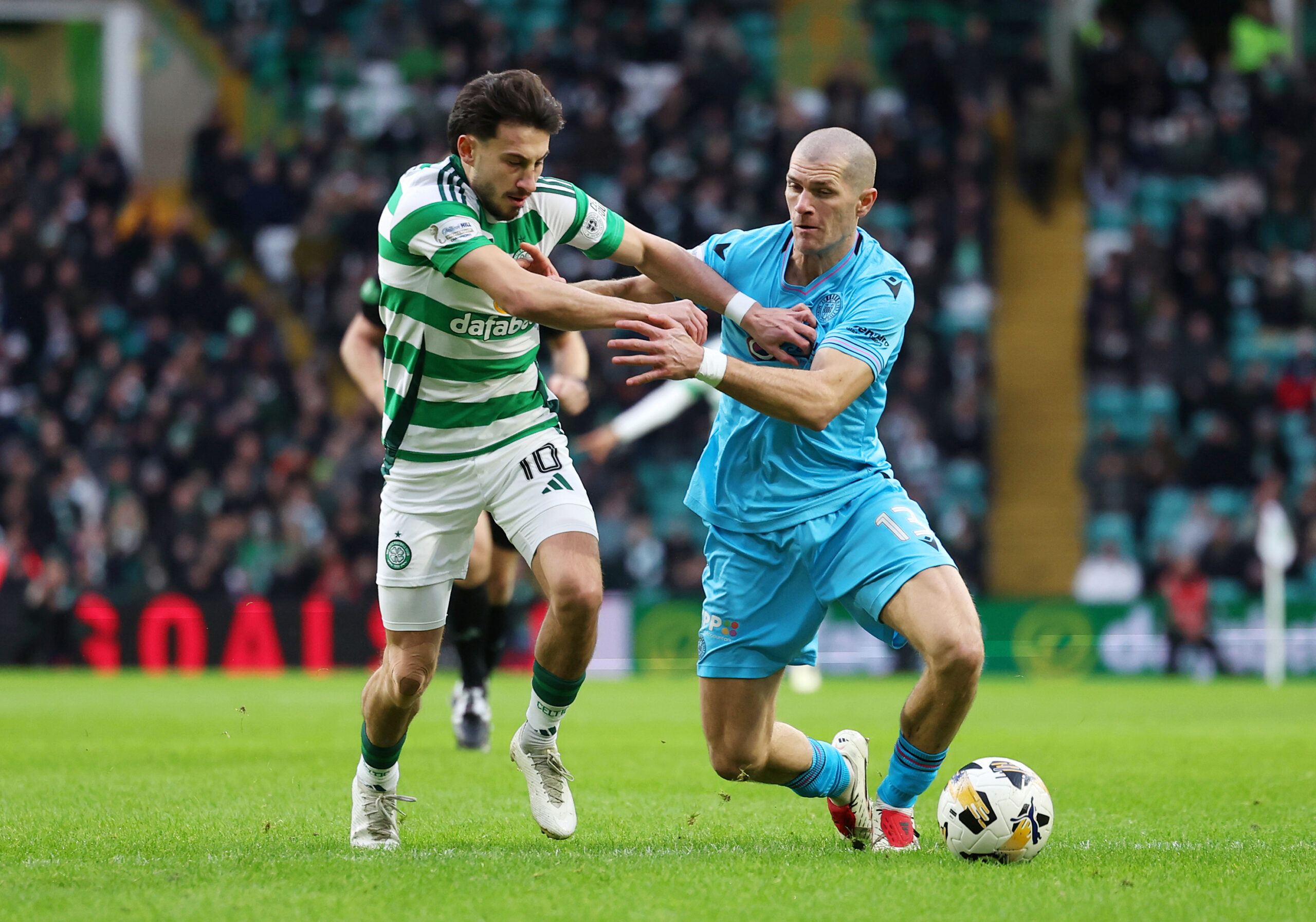 Celtic winger Nicolas Kuhn in action against St Mirren