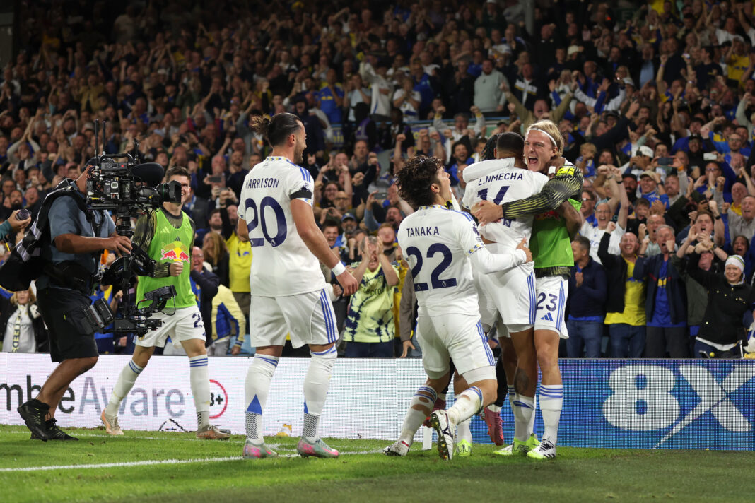 Leeds United players celebrate a goal against Everton
