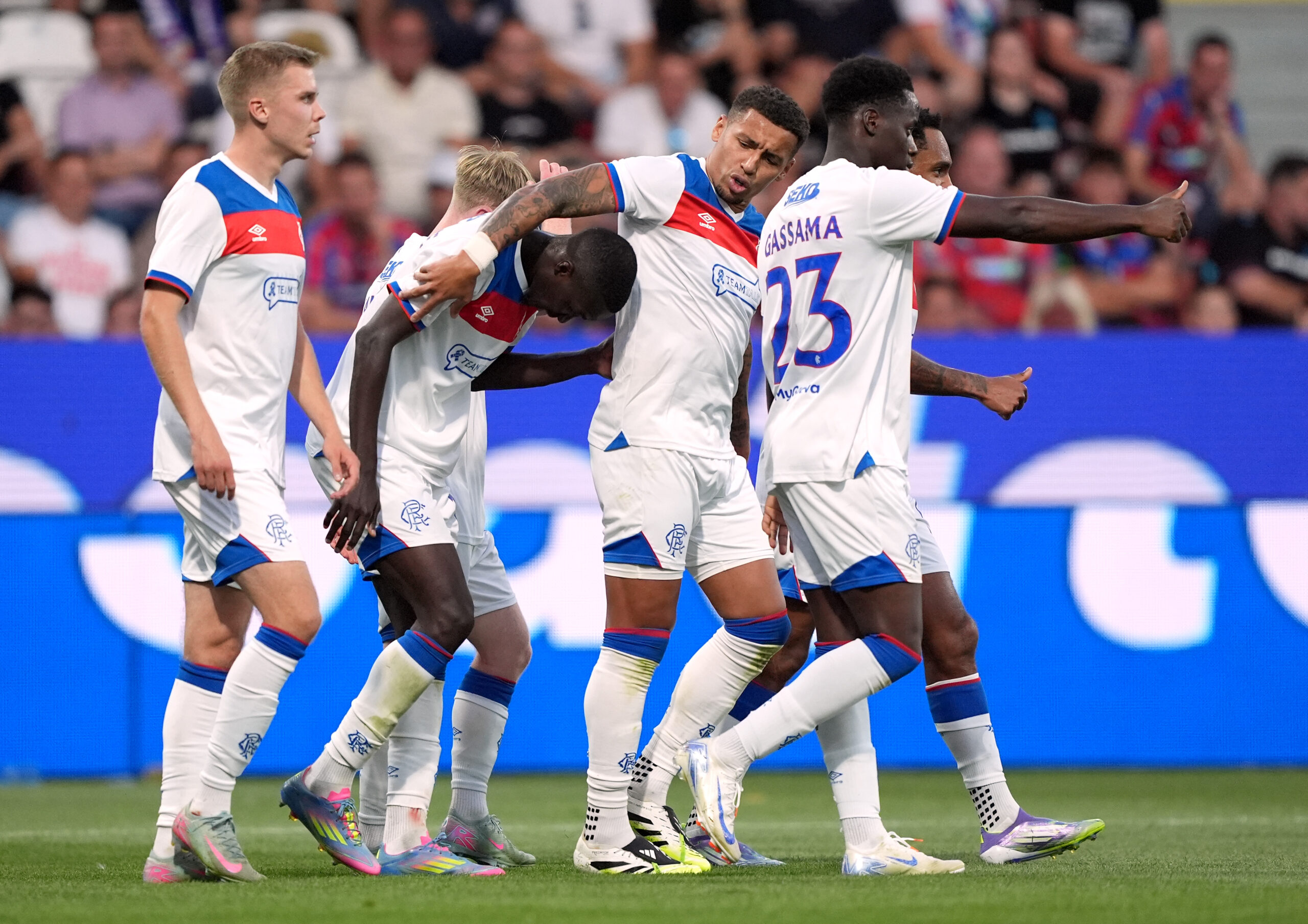 Rangers players celebrate a goal in Plzen