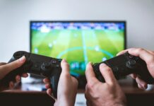 The Growing Overlap Between Football Fans And Esports Enthusiasts fans playing football on FIFA