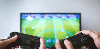 The Growing Overlap Between Football Fans And Esports Enthusiasts fans playing football on FIFA