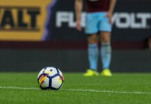 Portugal Still a Key Talent Market for Premier League Teams A Premier League lining up a football for a freekick.